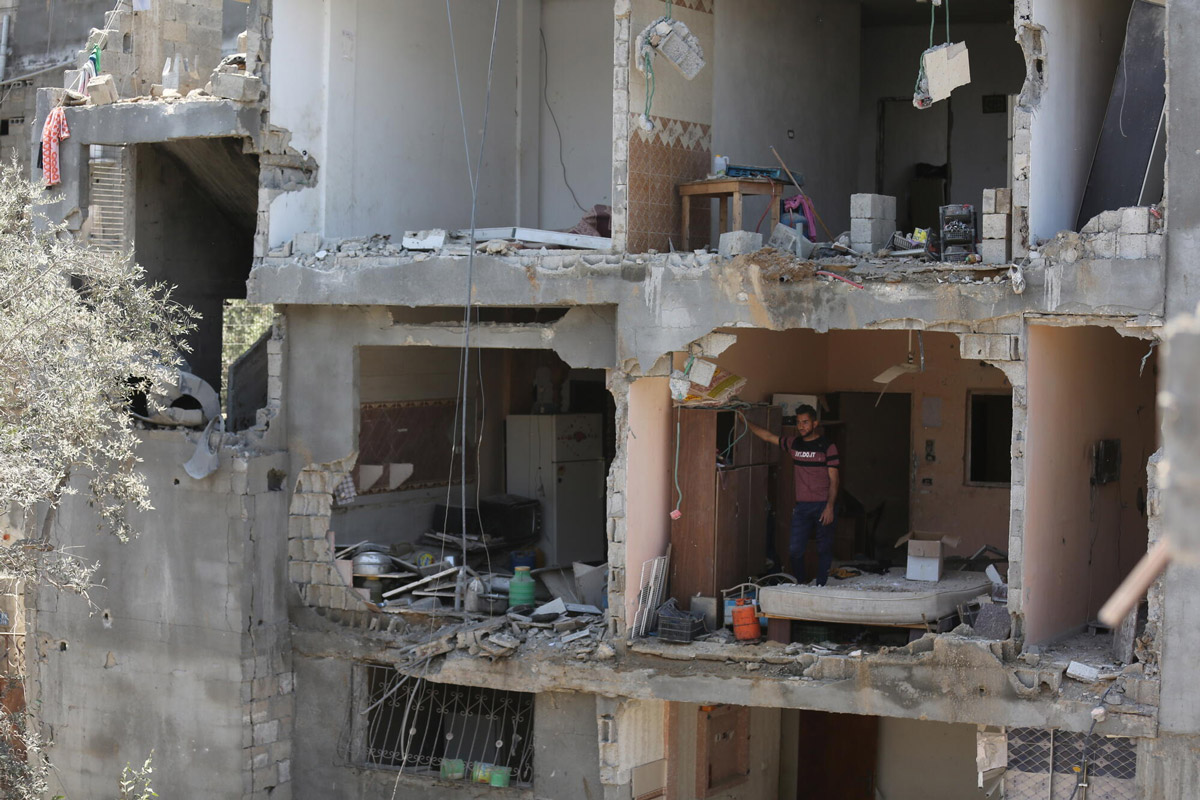 gaza-city-man-in-destroyed-apartment.jpg